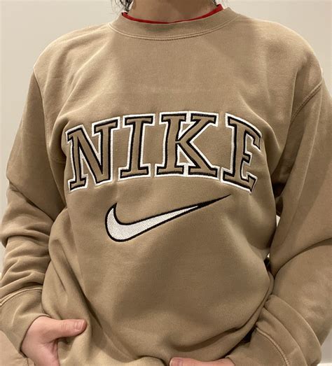 nike embroidered sweatshirts.